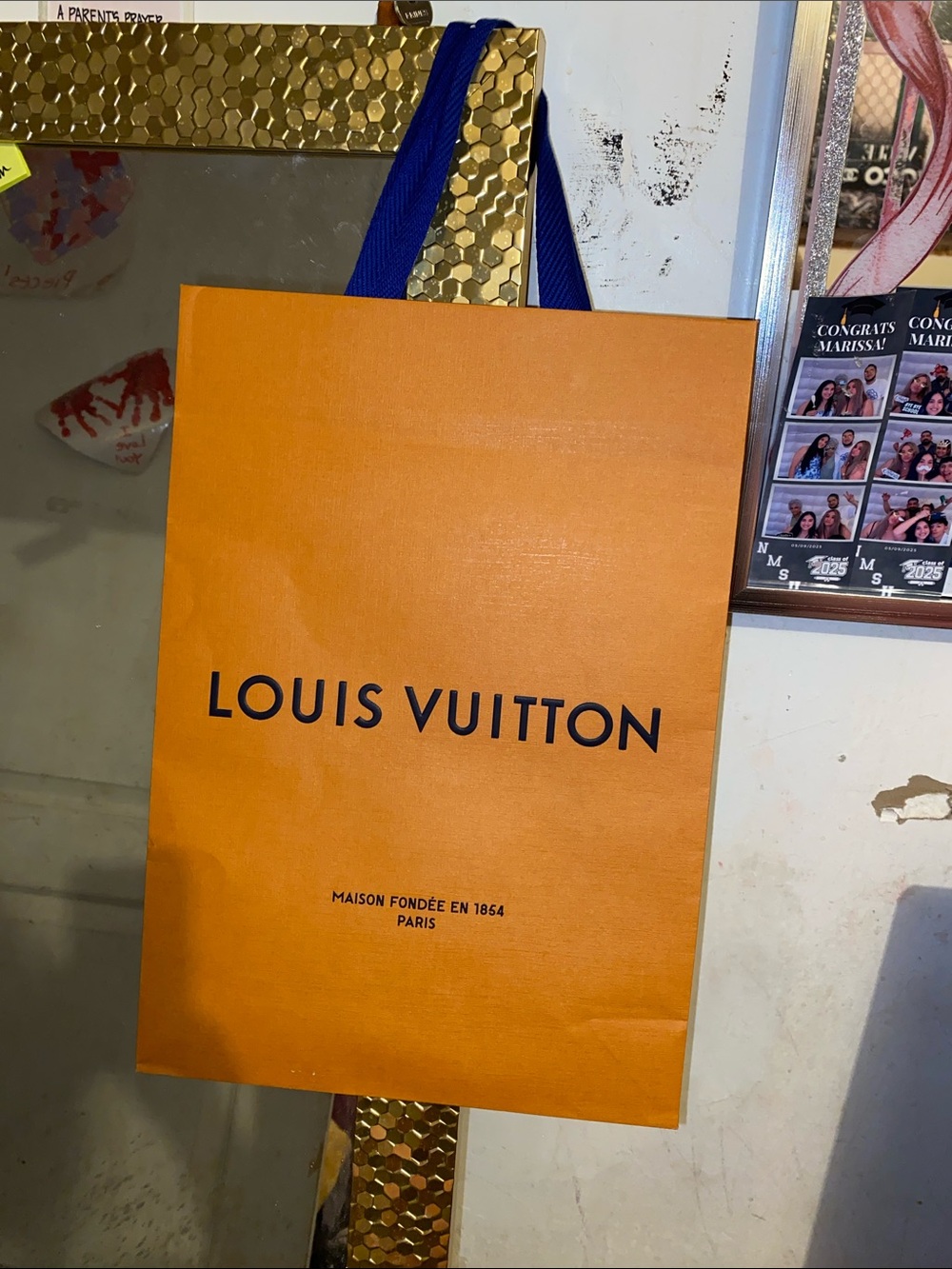 Louis Vuitton orange  Shopping Bag w Blue Handles and Black letters 
🧡